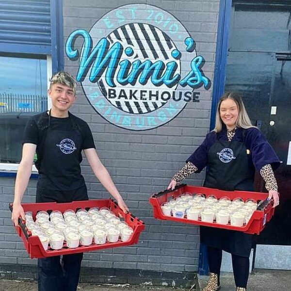 People holding trays of ice cream outside Mimi's Bakehouse