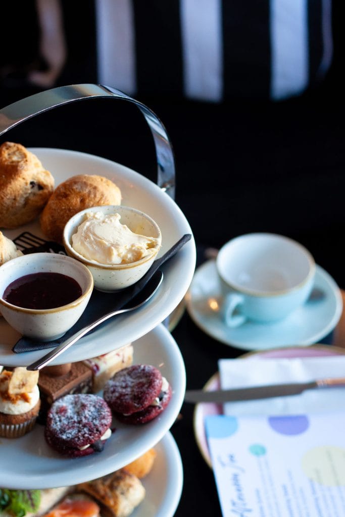 Mimi’s Afternoon Tea stand with scones, sweet bakes and savouries